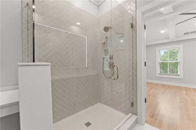 3932 Boston Common St, Suwanee, GA 30024 - bathroom featuring a stall shower, crown molding, beam ceiling, wood finished floors, and recessed lighting