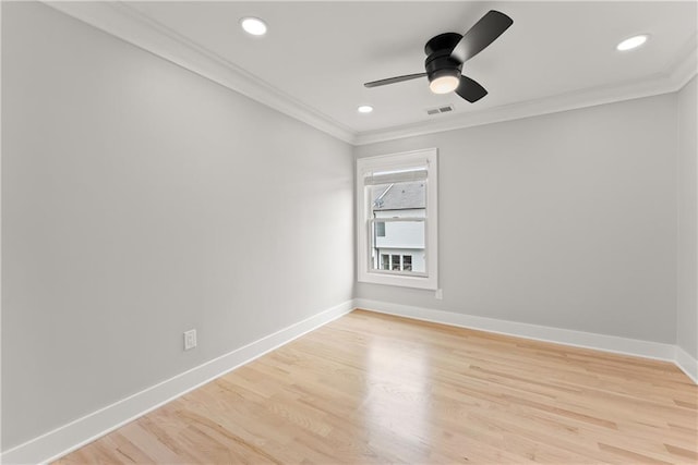 3932 Boston Common St, Suwanee, GA 30024 - spare room featuring ornamental molding, baseboards, ceiling fan, light wood finished floors, and recessed lighting