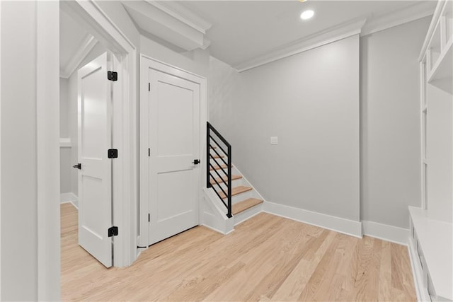 3932 Boston Common St, Suwanee, GA 30024 - hall featuring light wood-style flooring, crown molding, stairway, baseboards, and recessed lighting
