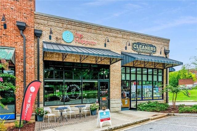 3932 Boston Common St, Suwanee, GA 30024 - view of commercial property featuring uncovered parking