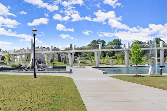 3932 Boston Common St, Suwanee, GA 30024 - view of home's community featuring a lawn and a water view