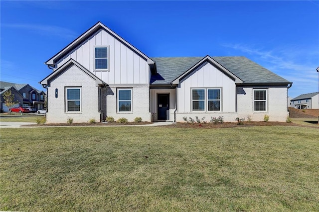 modern farmhouse with a front yard