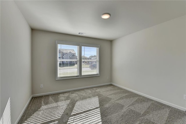 spare room with carpet flooring