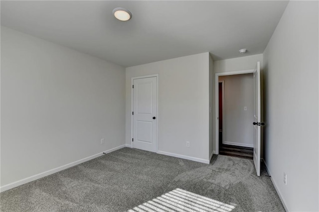 unfurnished bedroom with light carpet