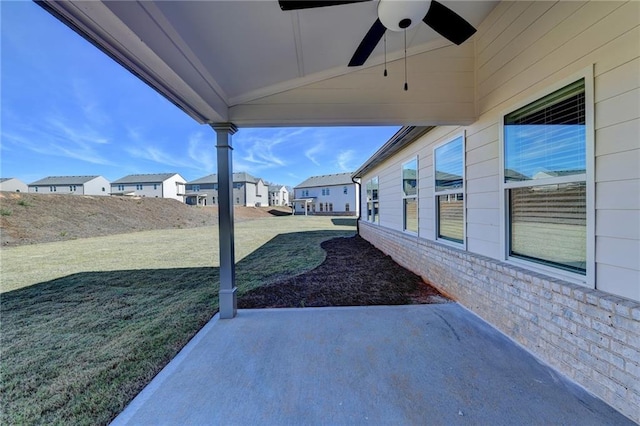 view of patio / terrace featuring ceiling fan