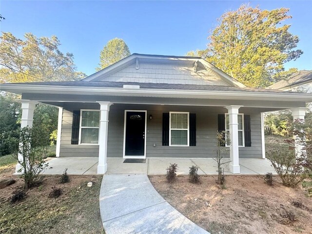 bungalow-style home with covered porch