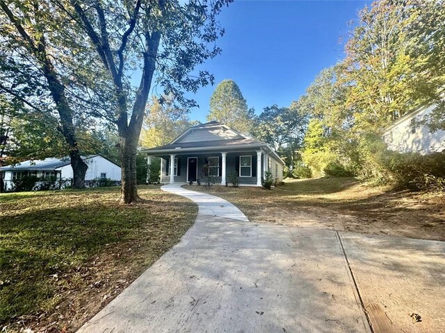 bungalow-style house featuring covered porch