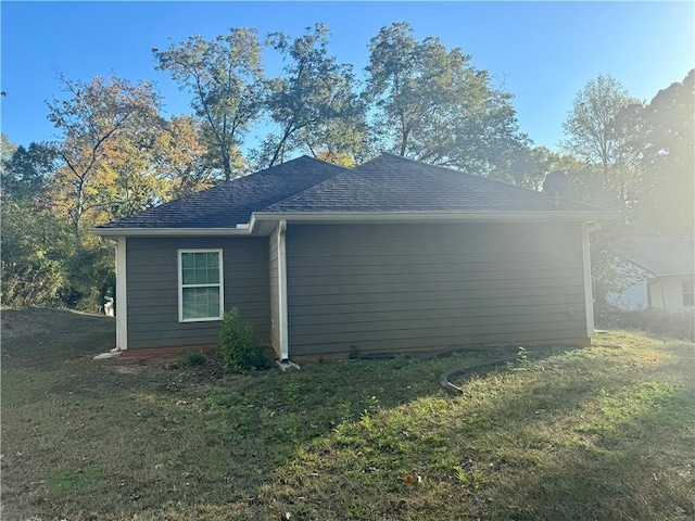 view of home's exterior featuring a lawn