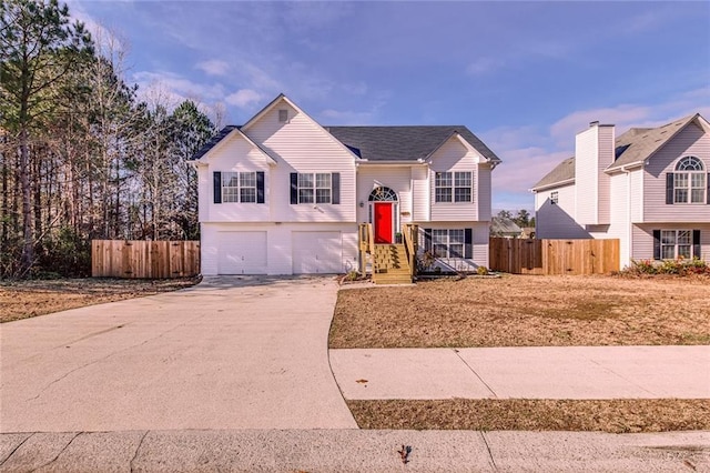 split foyer home featuring a garage