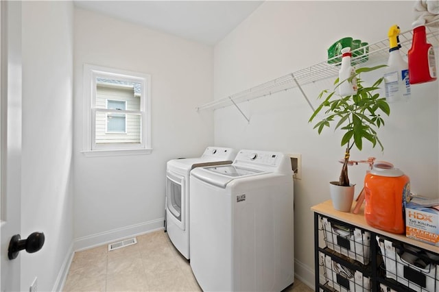 4108 Wyndam Hill Dr, Suwanee, GA 30024 - washroom featuring washer and clothes dryer and baseboards