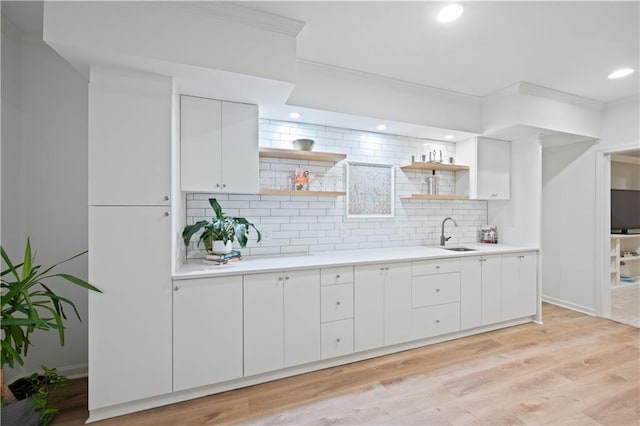 4108 Wyndam Hill Dr, Suwanee, GA 30024 - kitchen featuring open shelves, light countertops, tasteful backsplash, white cabinets, and recessed lighting