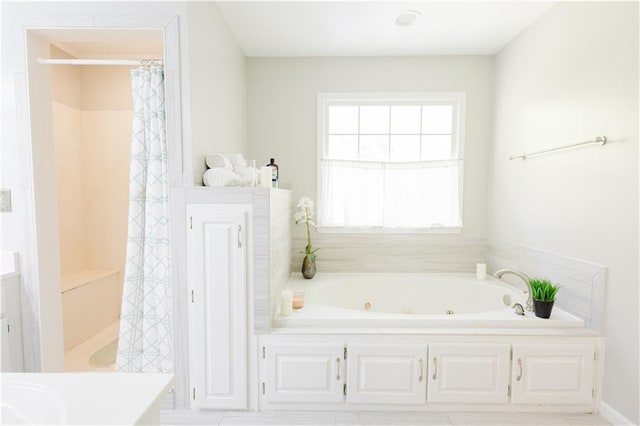 full bathroom featuring a shower with curtain, vanity, and a tub with jets