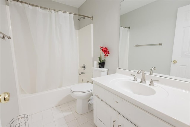 full bathroom featuring vanity, shower / tub combo, tile patterned flooring, and toilet