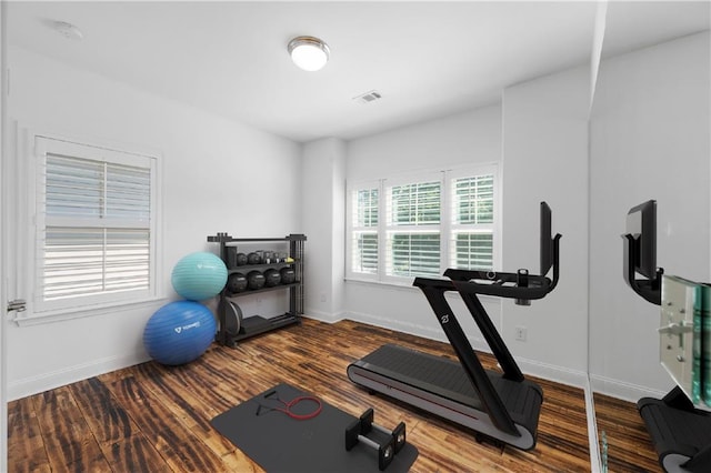 exercise area with wood-type flooring