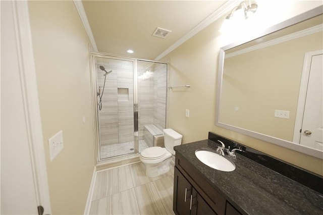 full bath with toilet, a stall shower, crown molding, and vanity