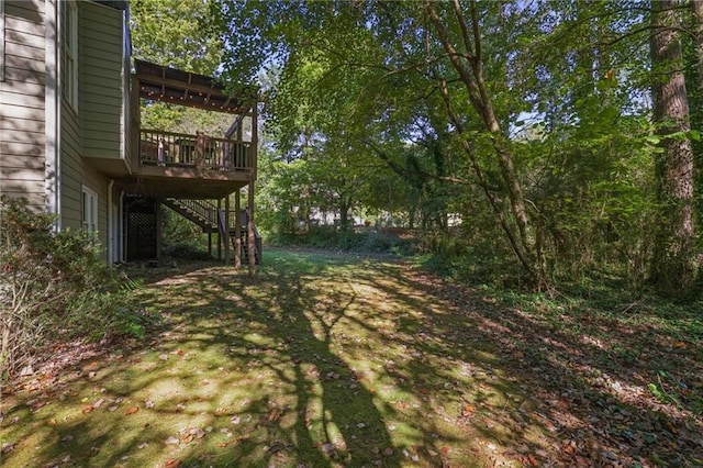 view of yard featuring a deck