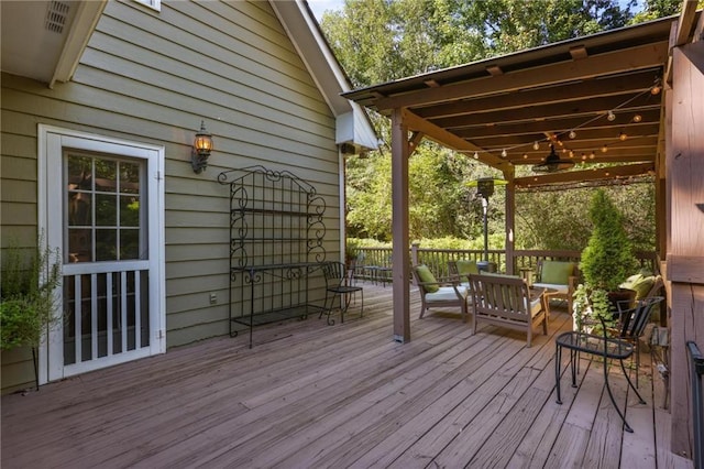 wooden deck with ceiling fan