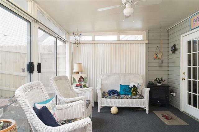 sunroom / solarium with ceiling fan