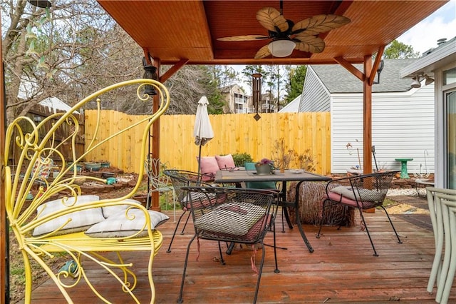 wooden deck with ceiling fan