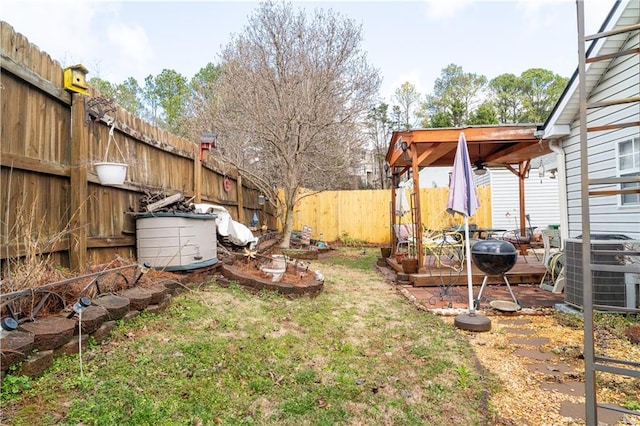 view of yard featuring central AC