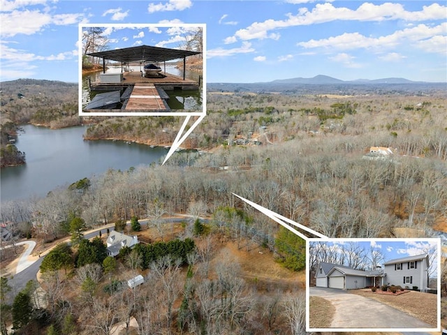 drone / aerial view featuring a water and mountain view