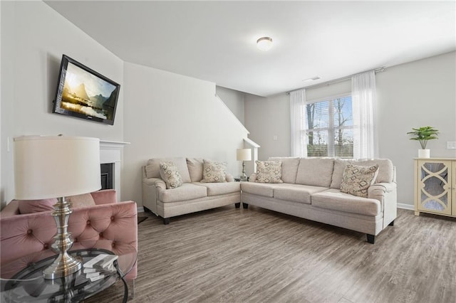 living room with hardwood / wood-style flooring