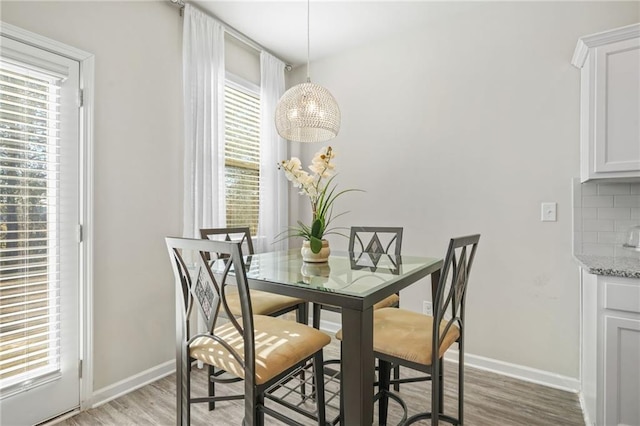 dining space featuring light hardwood / wood-style flooring