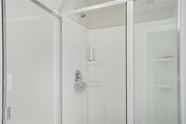 bathroom with an enclosed shower