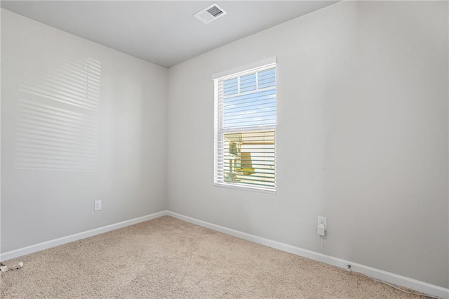 view of carpeted spare room