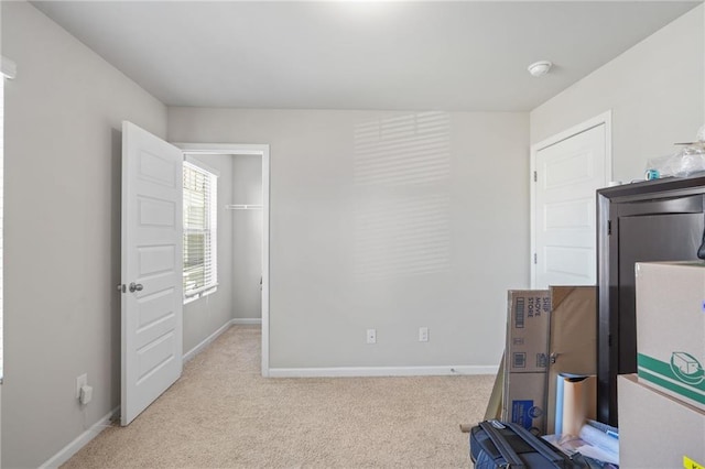 bedroom with light colored carpet