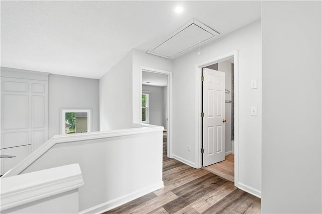615 Rosedown Way, Alpharetta, GA 30022 - hall with attic access and wood finished floors