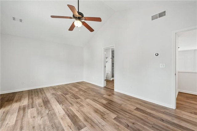 615 Rosedown Way, Alpharetta, GA 30022 - empty room with high vaulted ceiling, ceiling fan, and wood finished floors