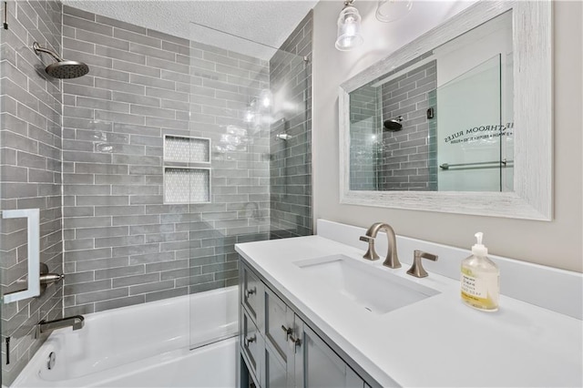 615 Rosedown Way, Alpharetta, GA 30022 - bathroom featuring shower / tub combination, vanity, and a textured ceiling
