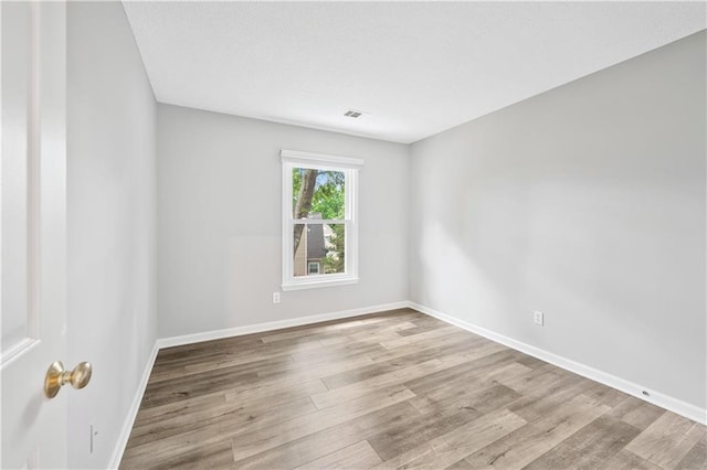 615 Rosedown Way, Alpharetta, GA 30022 - empty room with wood finished floors and baseboards