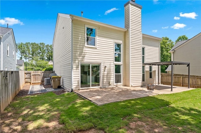 615 Rosedown Way, Alpharetta, GA 30022 - rear view of property with a chimney, a patio, and a fenced backyard