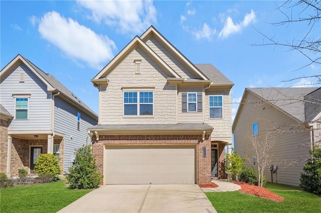 craftsman house with concrete driveway, brick siding, an attached garage, and a front yard