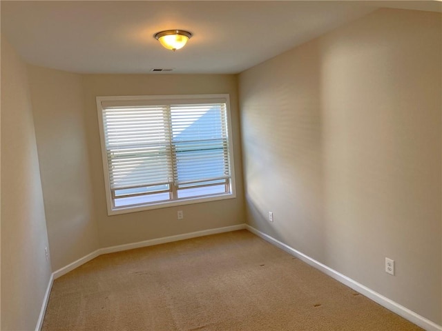 view of carpeted spare room