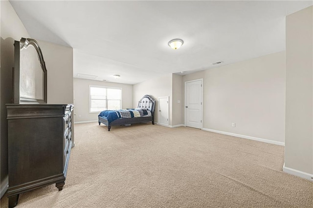 bedroom with light carpet, visible vents, and baseboards
