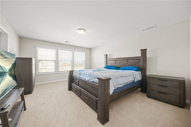 bedroom featuring light colored carpet, visible vents, and baseboards