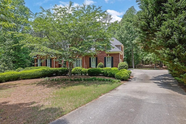 view of front of home with brick siding