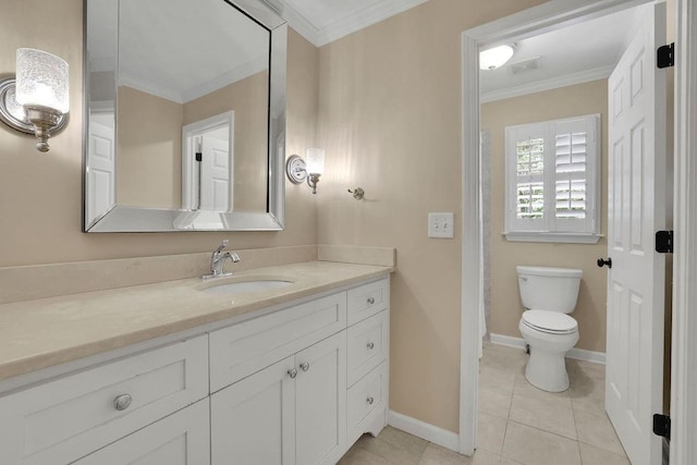 bathroom featuring vanity, ornamental molding, tile patterned flooring, toilet, and baseboards
