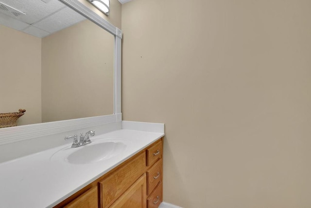 bathroom featuring visible vents and vanity