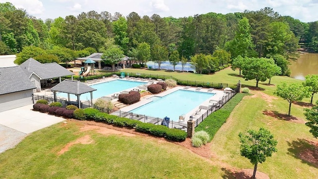 pool with a lawn, a gazebo, and fence