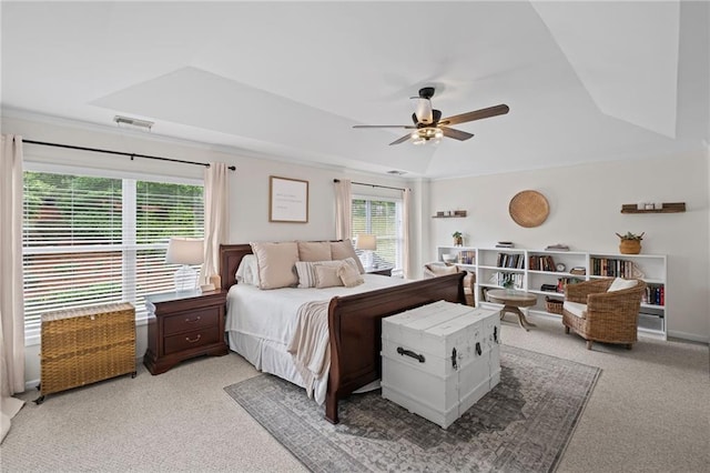 121 Bradshaw Park Dr, Woodstock, GA 30188 - bedroom featuring light carpet, a tray ceiling, and ceiling fan