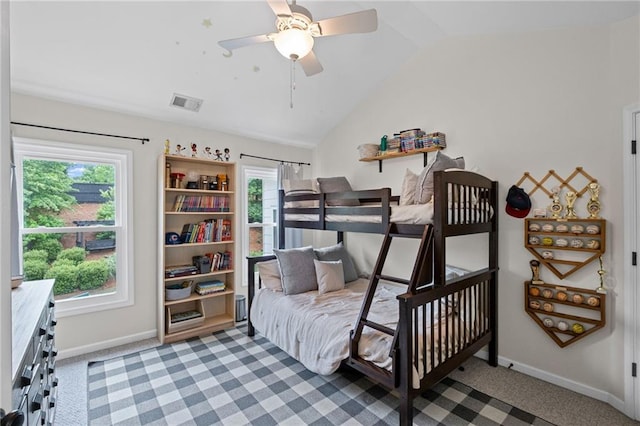 121 Bradshaw Park Dr, Woodstock, GA 30188 - carpeted bedroom featuring vaulted ceiling, baseboards, and a ceiling fan