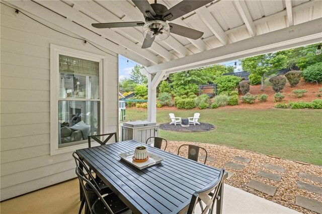 121 Bradshaw Park Dr, Woodstock, GA 30188 - view of patio featuring ceiling fan and outdoor dining area