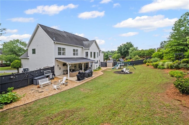 121 Bradshaw Park Dr, Woodstock, GA 30188 - back of house featuring a playground, an outdoor hangout area, and a patio