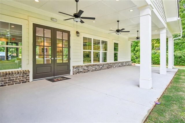 view of patio featuring french doors and ceiling fan