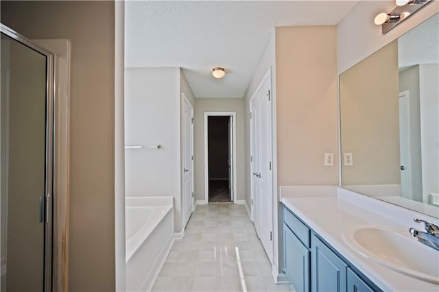 3223 Tallon Ln SW, Atlanta, GA 30311 - full bath featuring vanity, a garden tub, a stall shower, and baseboards