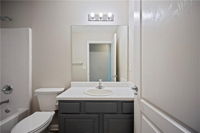 3223 Tallon Ln SW, Atlanta, GA 30311 - full bathroom featuring toilet, vanity, and shower / washtub combination